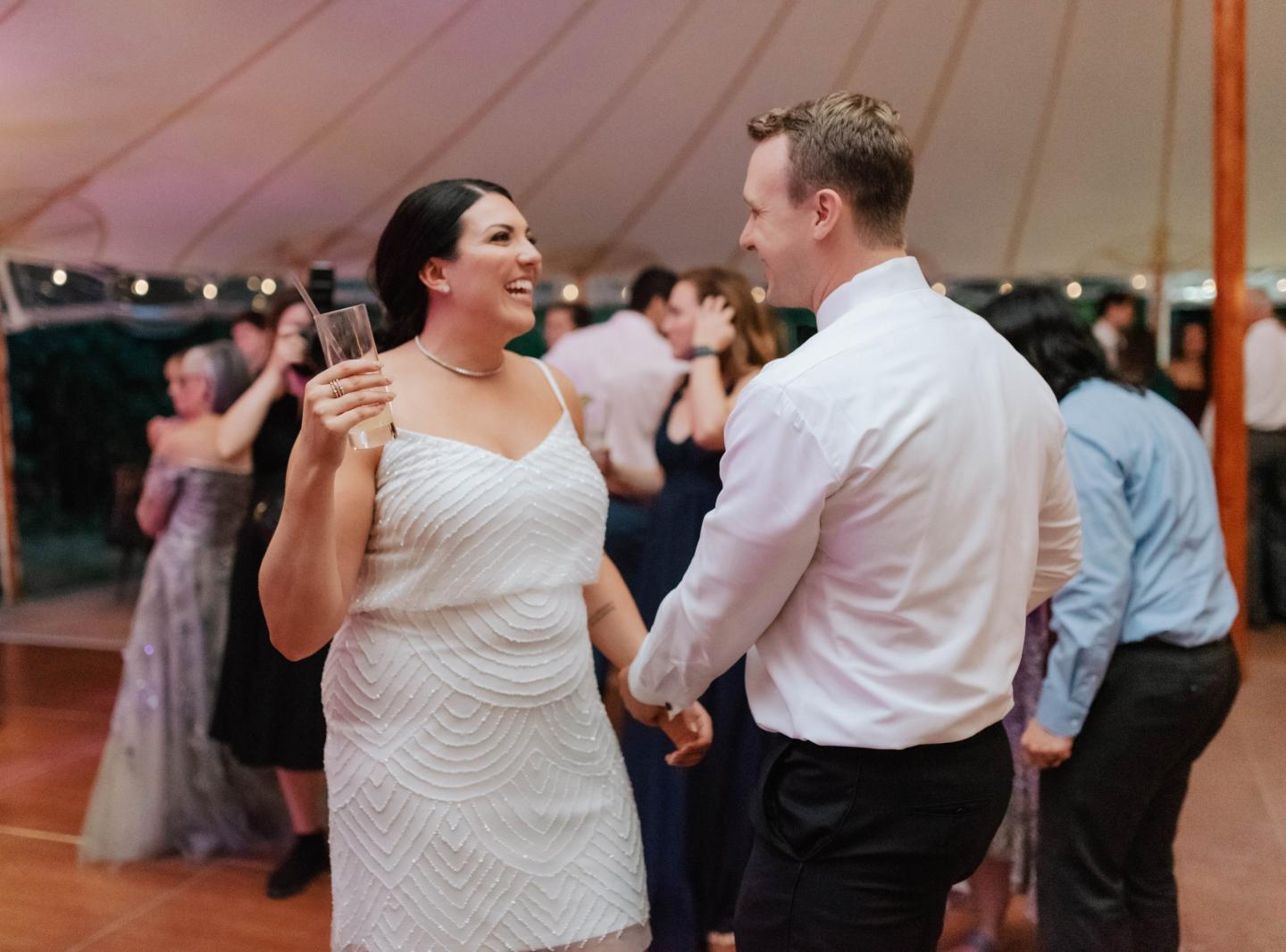 A bride and groom dancing