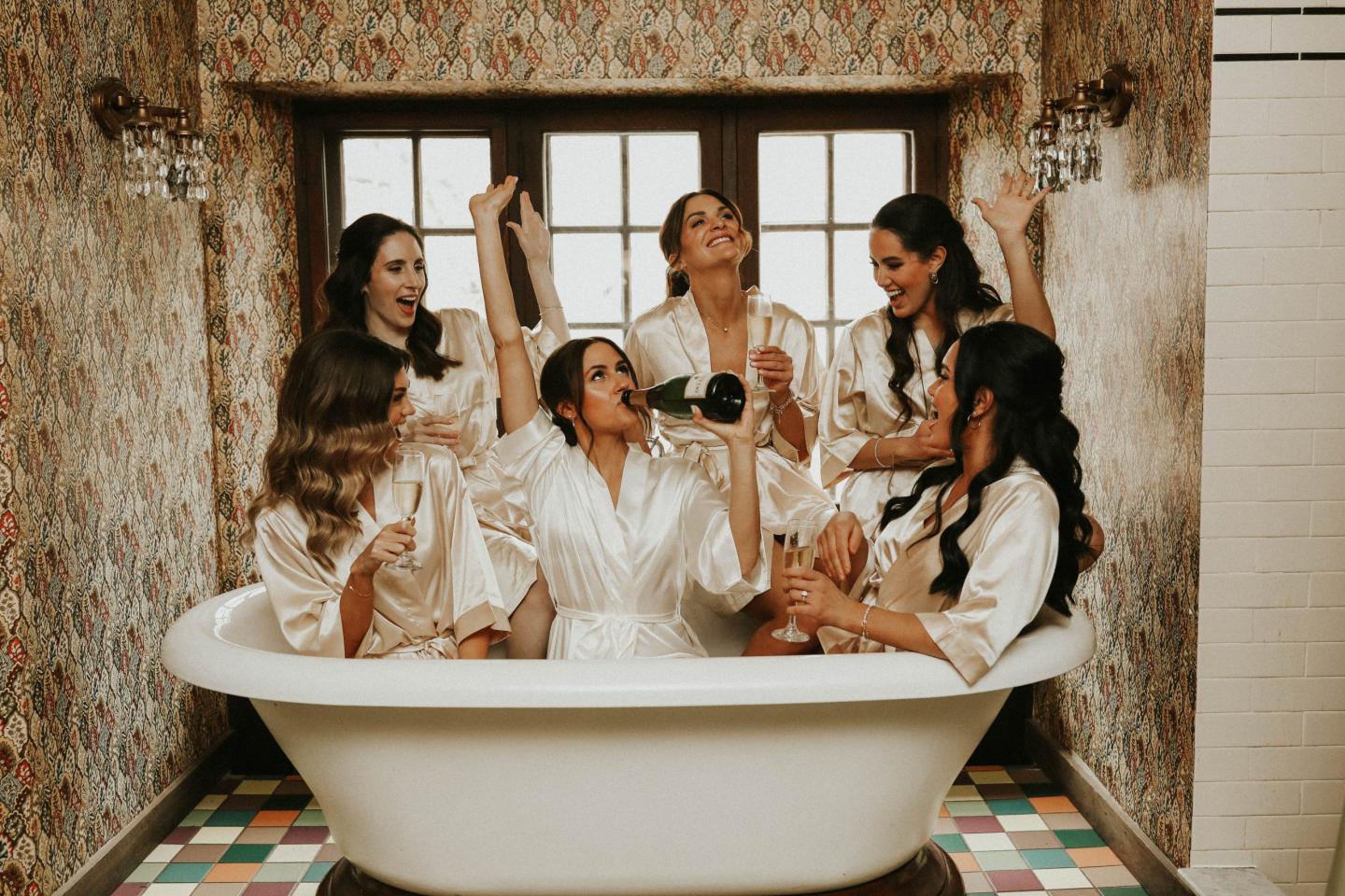 A bridal party in a bathtub 