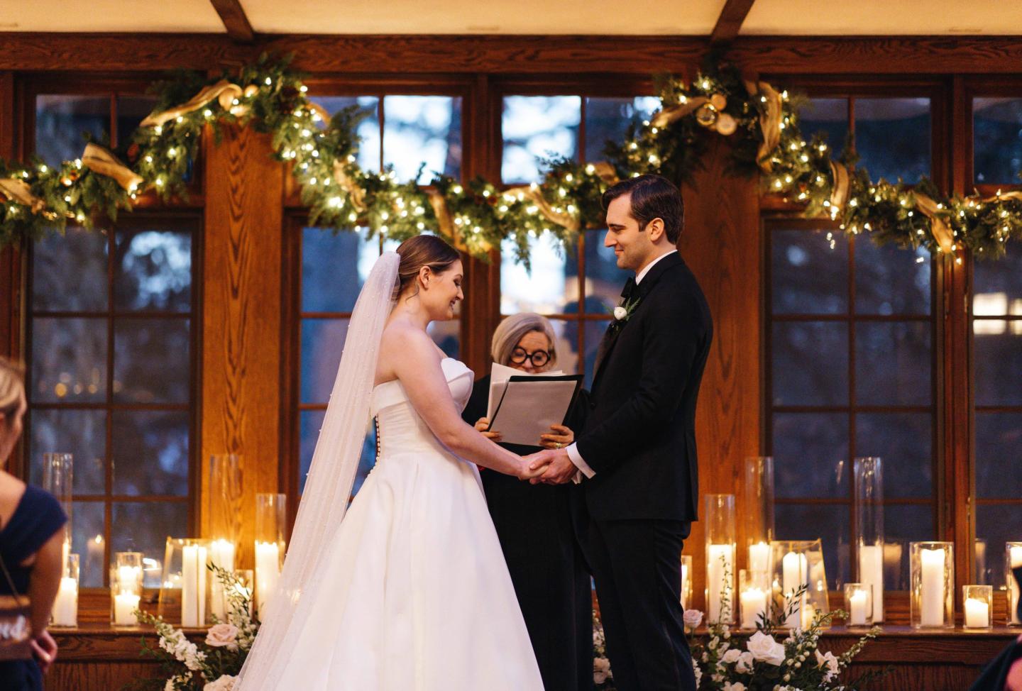 A bride and groom at an altar