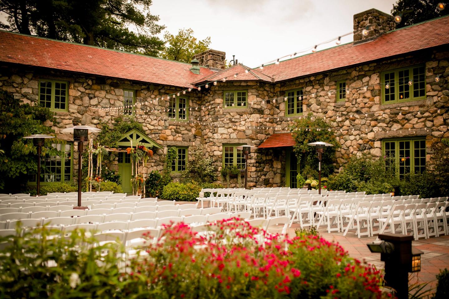 A courtyard set up for a wedding ceremony