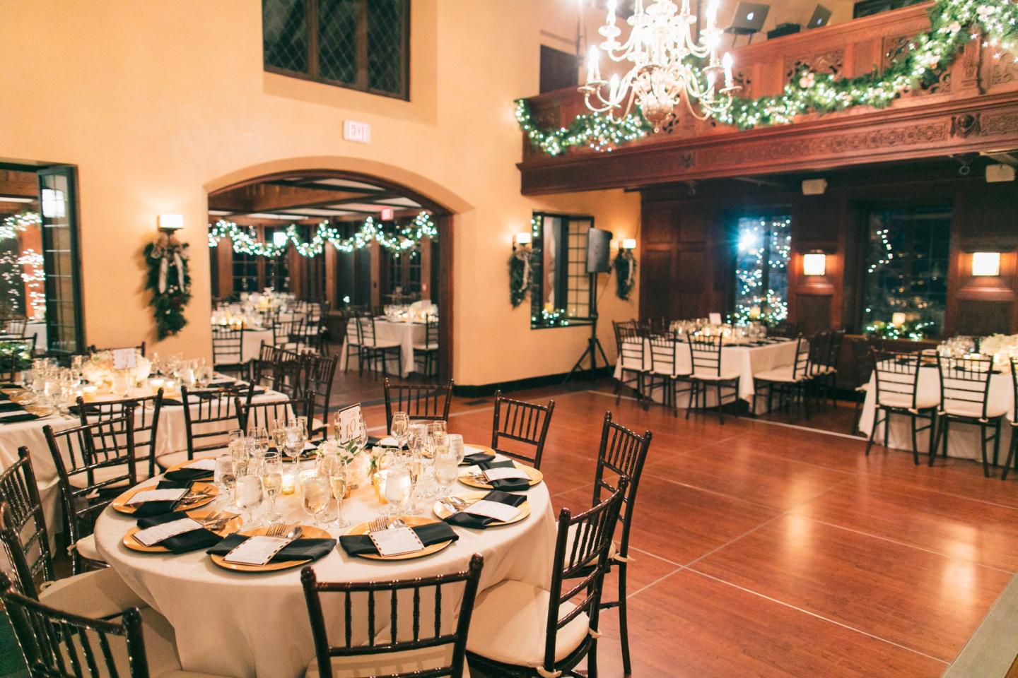 A grand hall set up for a wedding reception