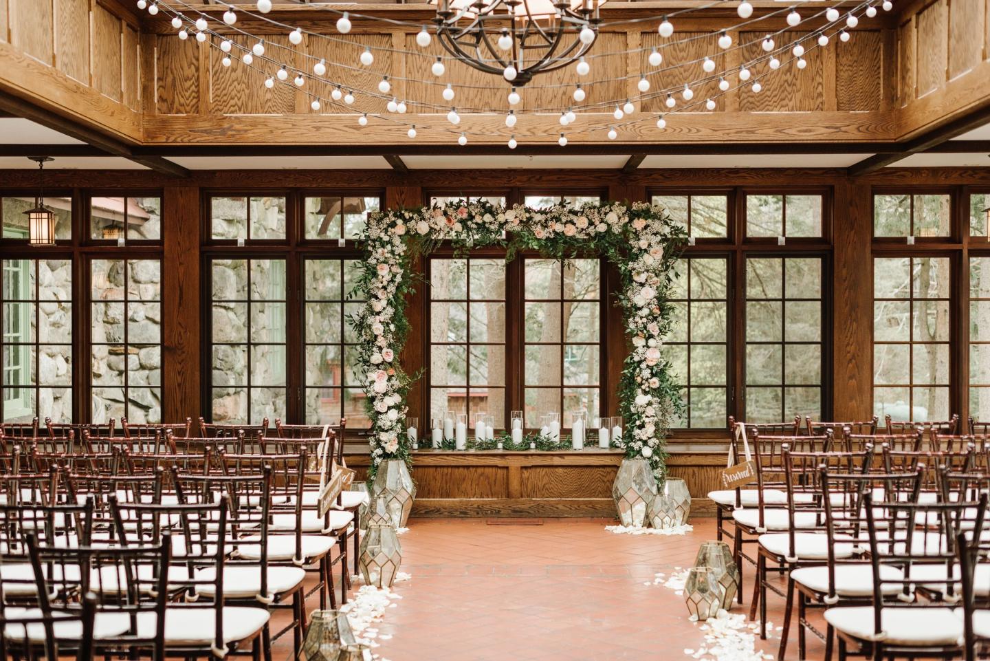 A conservatory set up for a wedding ceremony