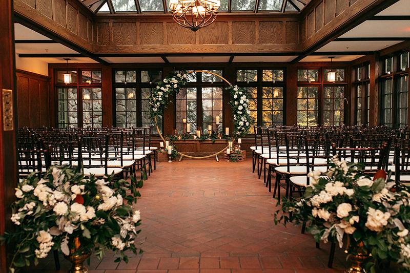 A conservatory set up for a wedding ceremony