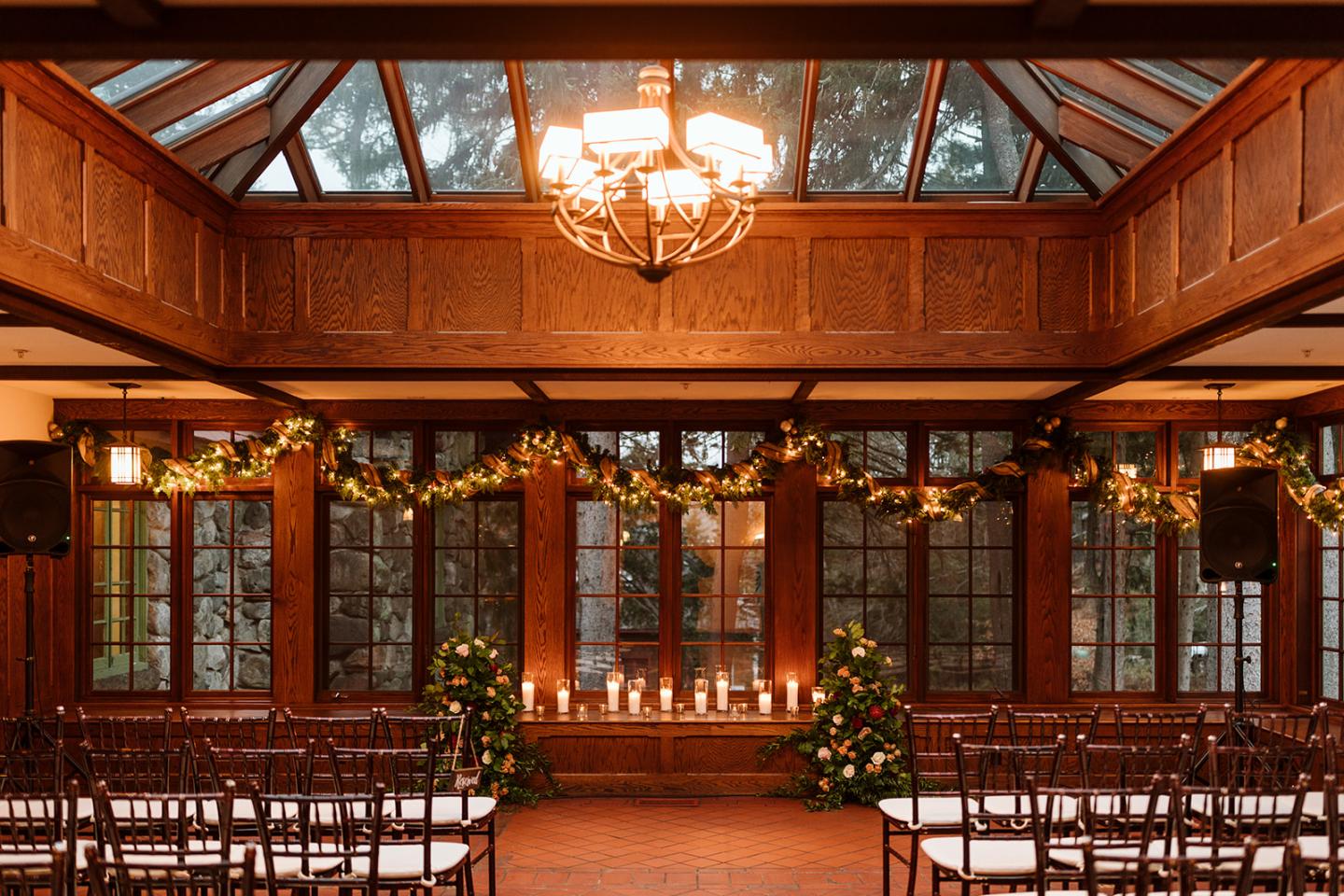 A conservatory set up for a wedding ceremony