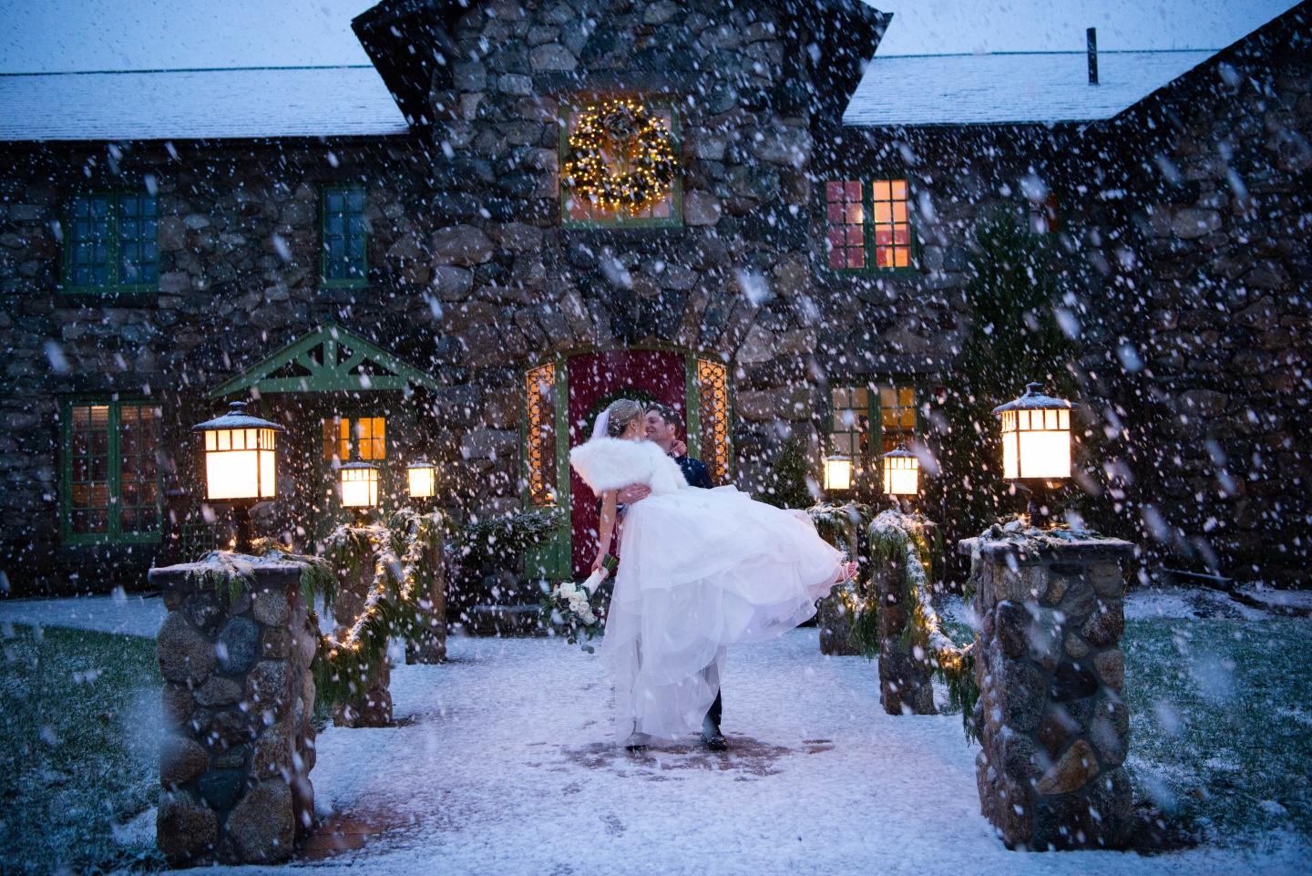 A bride and groom in the snow
