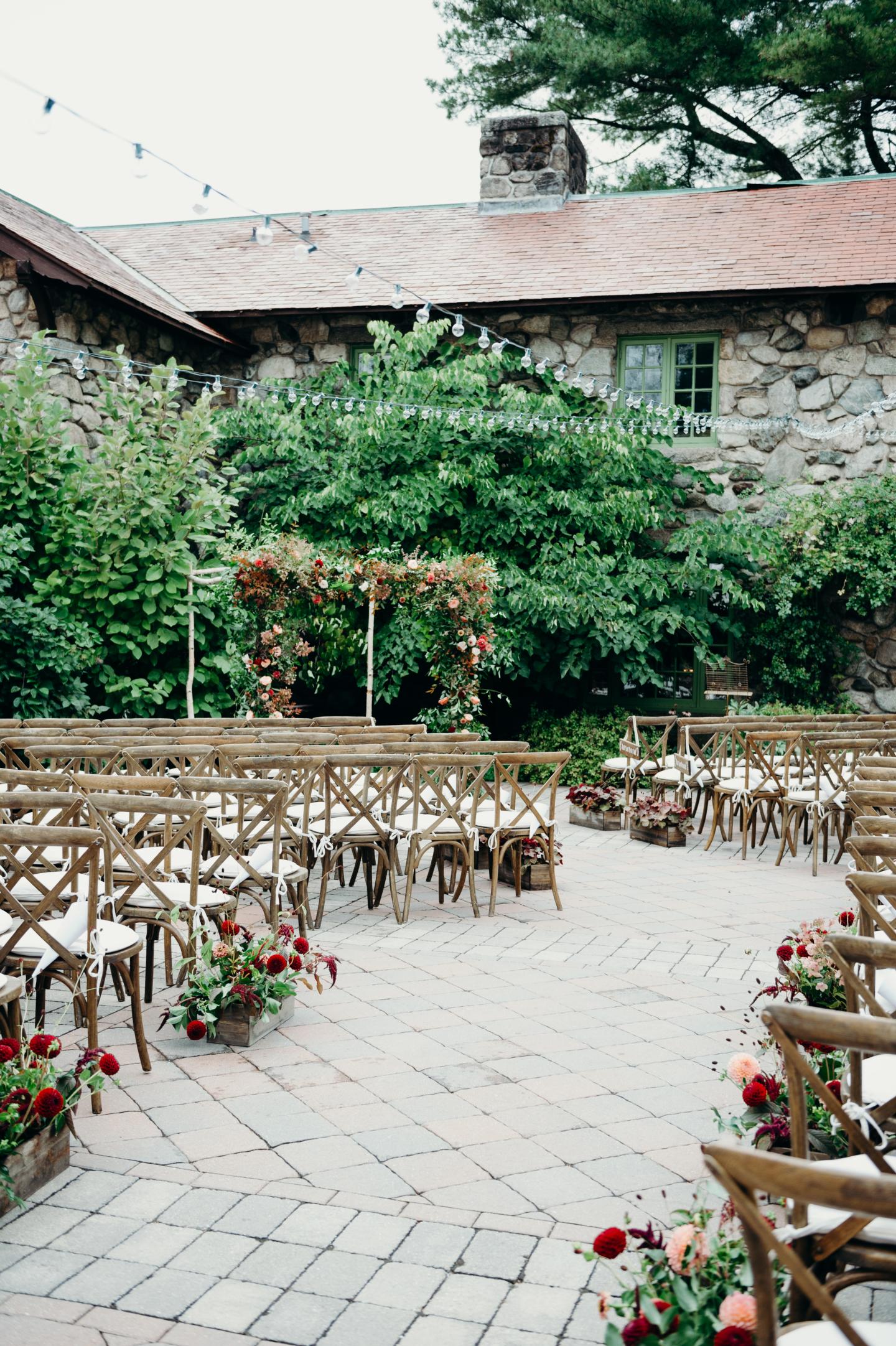 A courtyard set up for a wedding ceremony