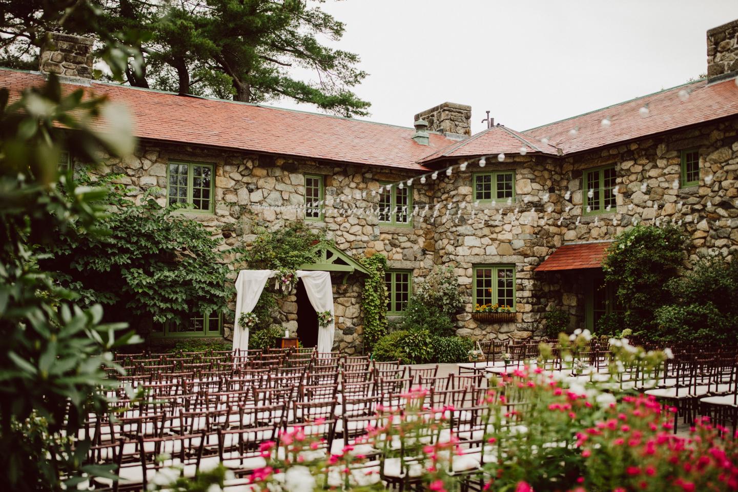 A courtyard set up for a wedding ceremony