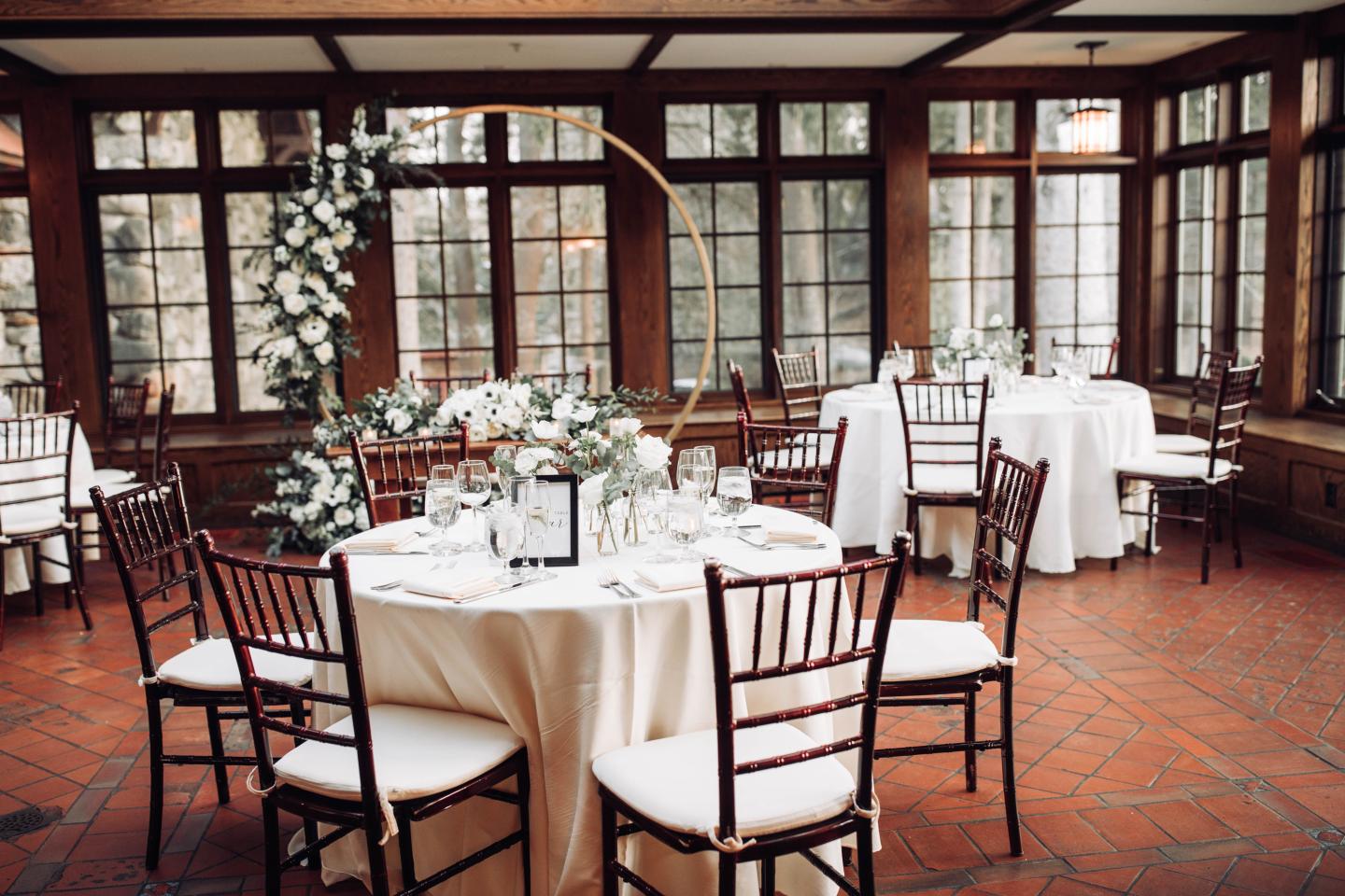 A conservatory set up for a wedding reception