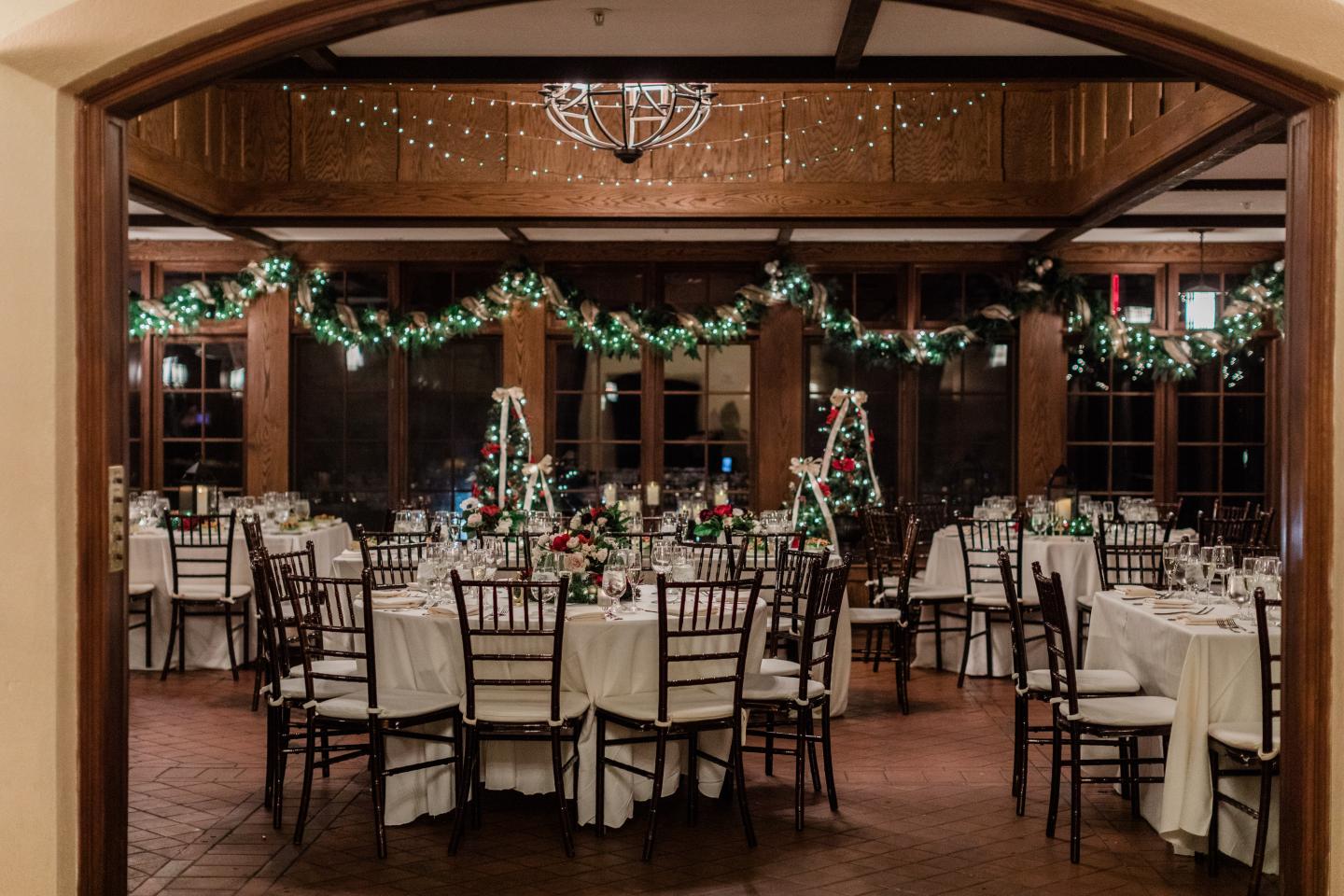A conservatory set up for a wedding reception