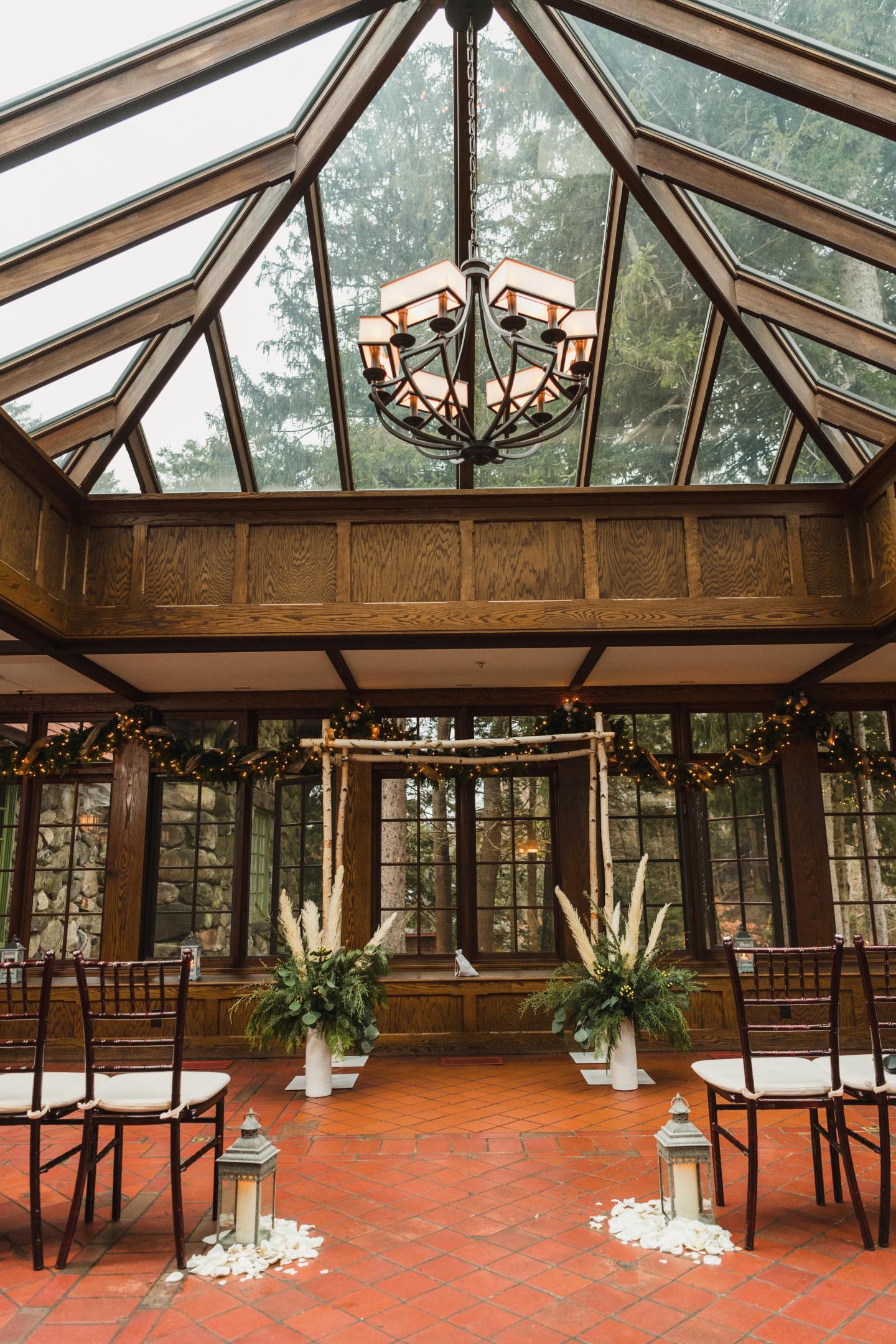 A conservatory set up for a wedding ceremony