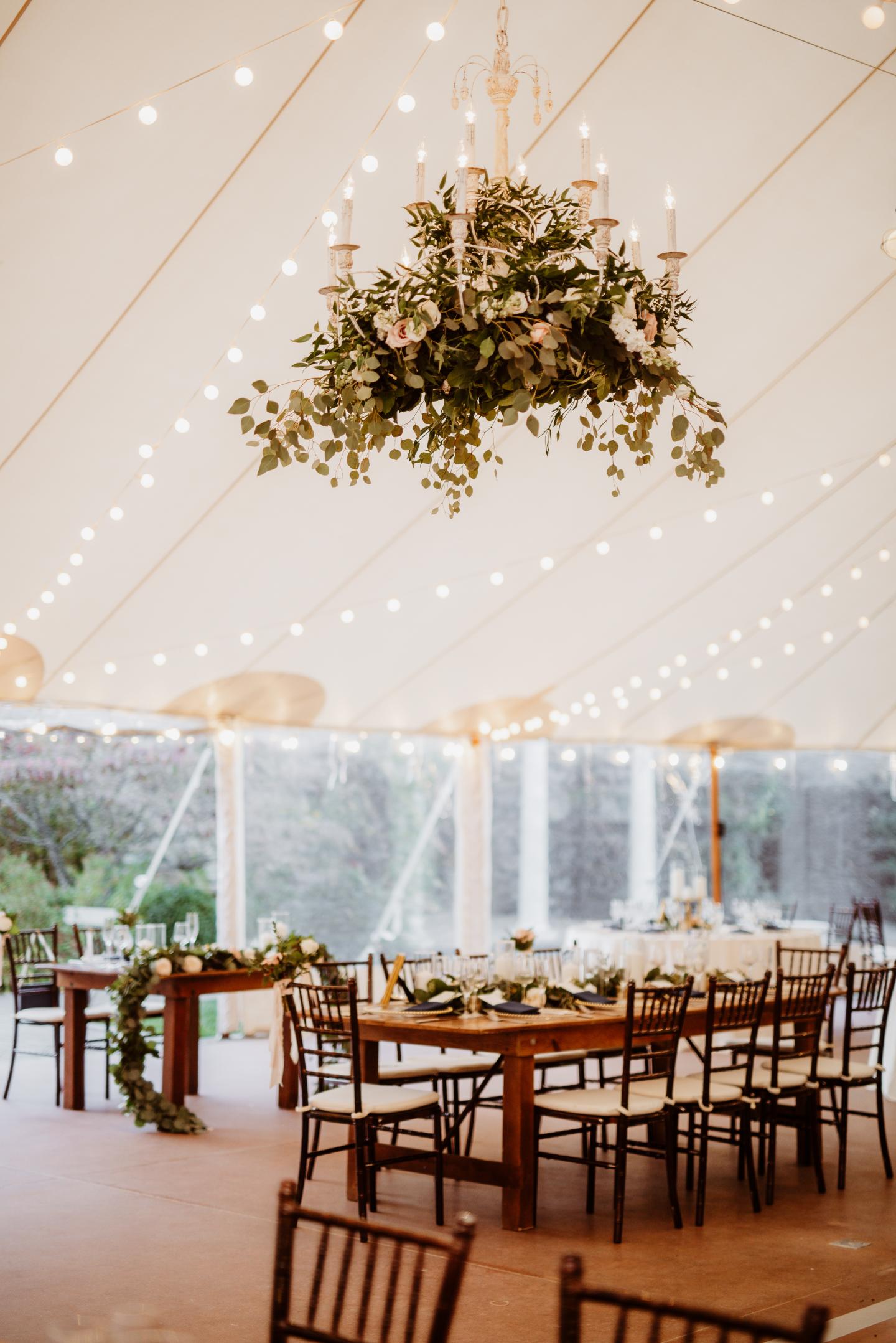 A tent set up for a wedding reception