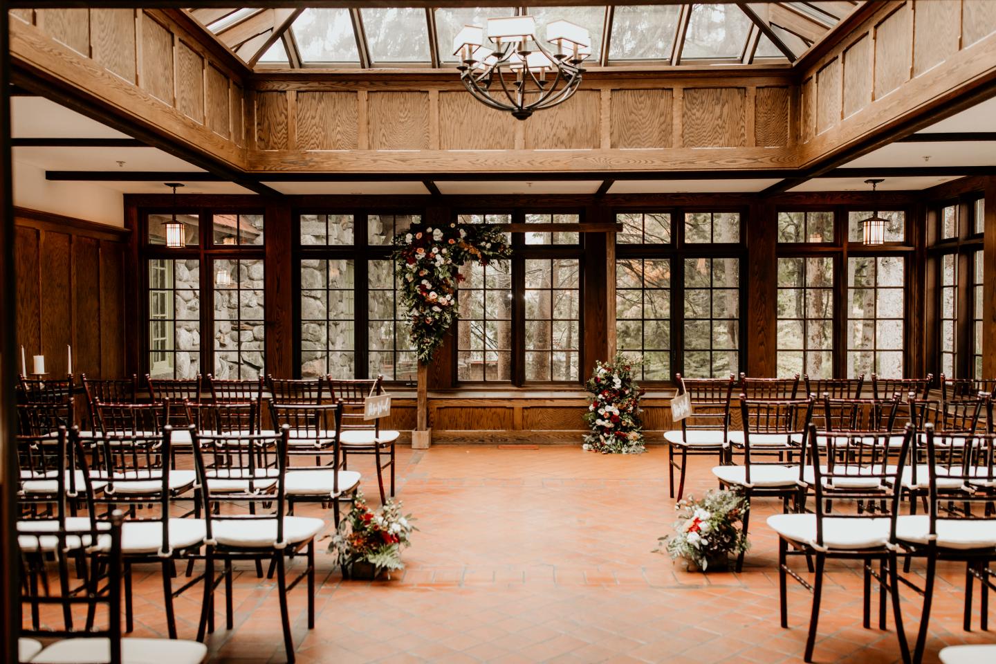 A conservatory set up for a wedding ceremony