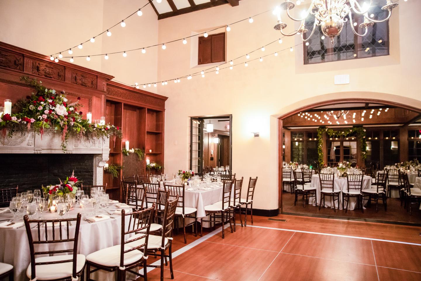 A hall set up for a wedding reception