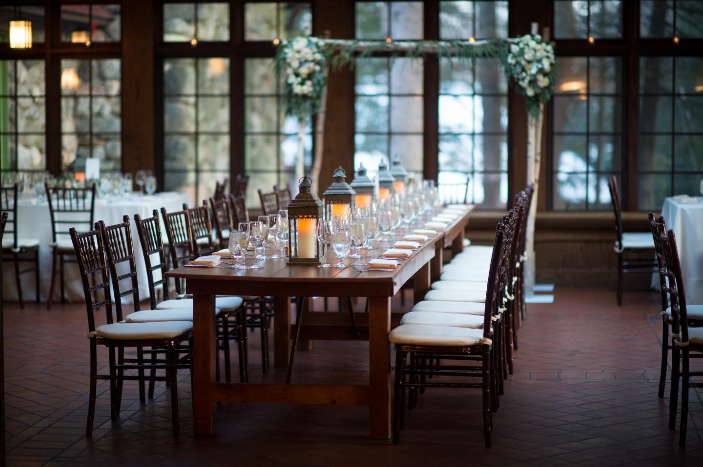 A conservatory set up for a wedding reception