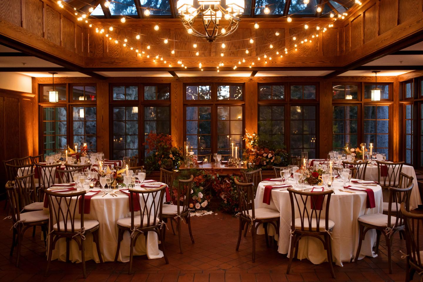 A conservatory set up for a wedding reception