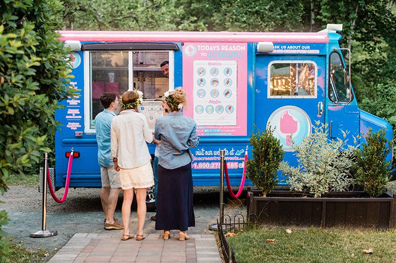 People lining up at a food truck