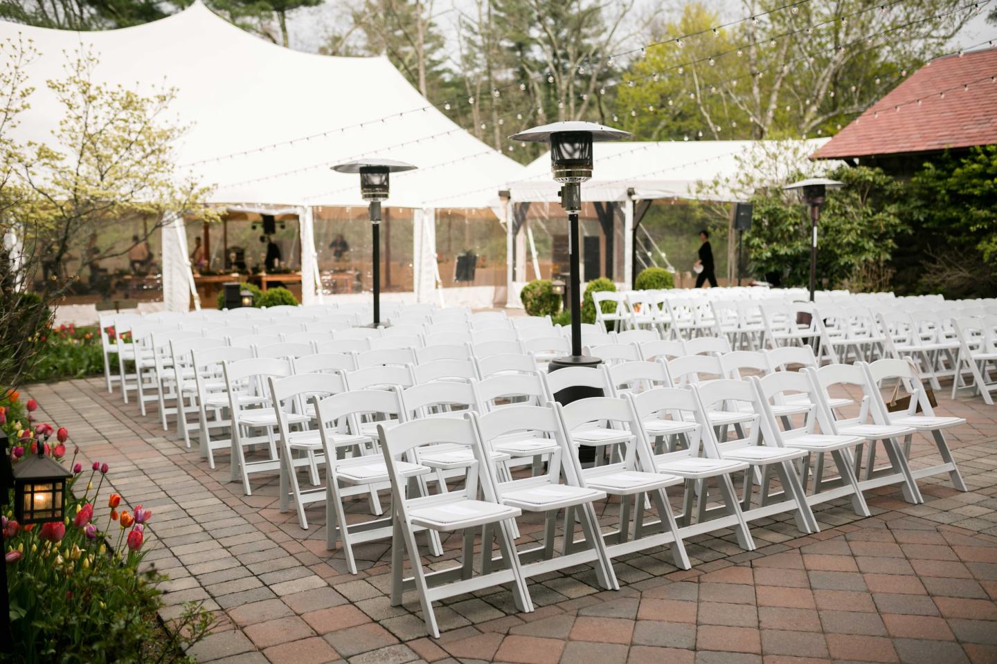 A courtyard set up for a wedding ceremony