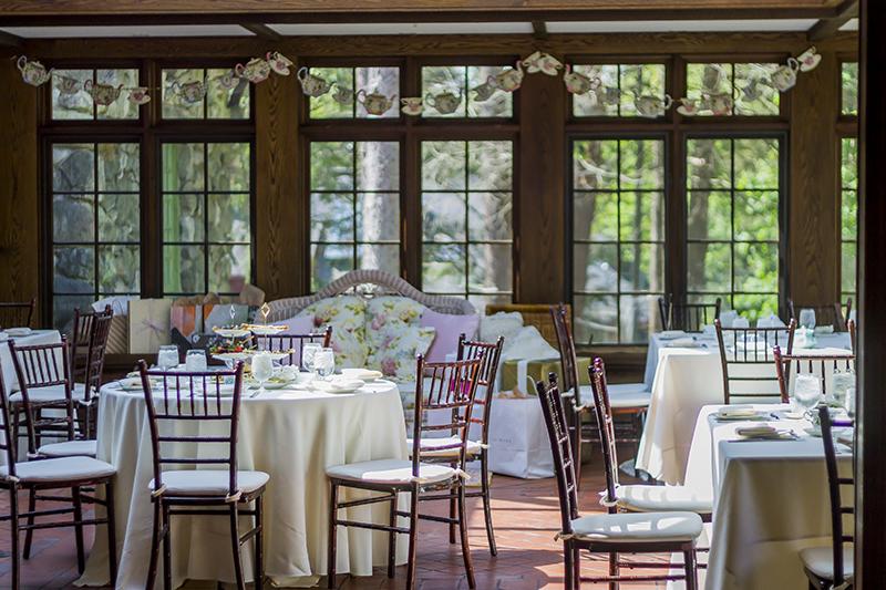 A conservatory set up for a wedding reception