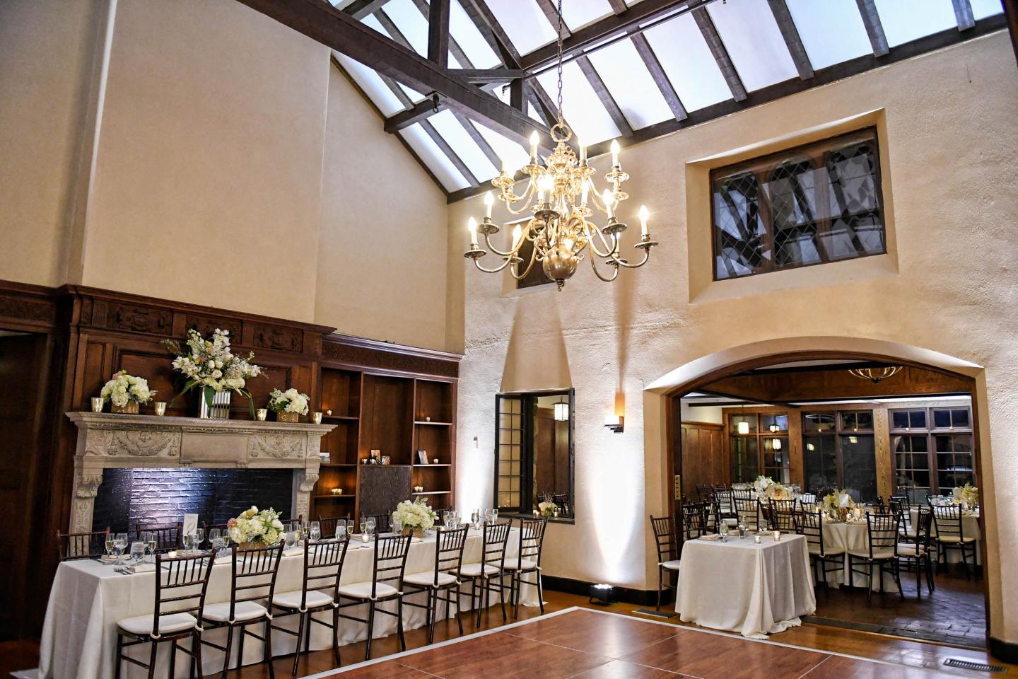 A traditional hall set up for a wedding reception