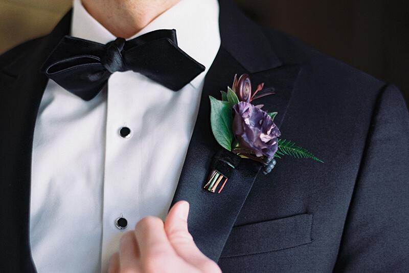 A close up of a suit