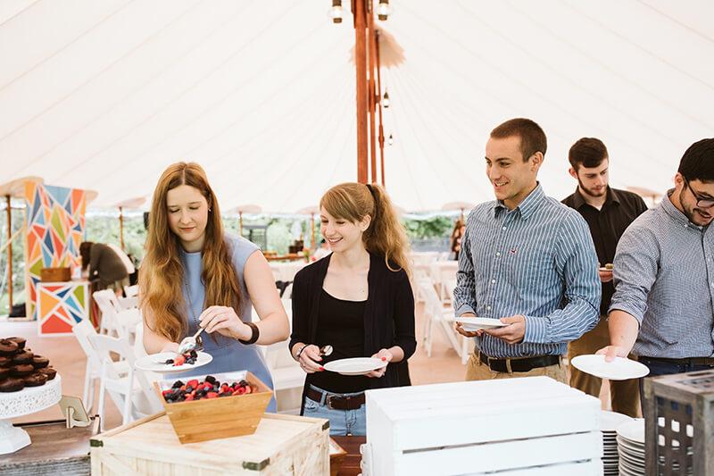 Wedding guests helping themselves to food