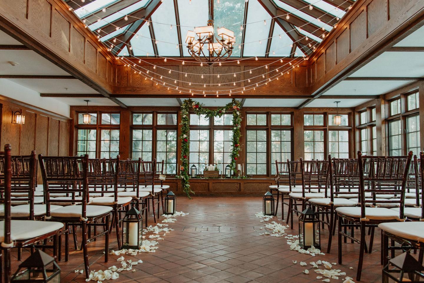 A conservatory set up for a wedding reception