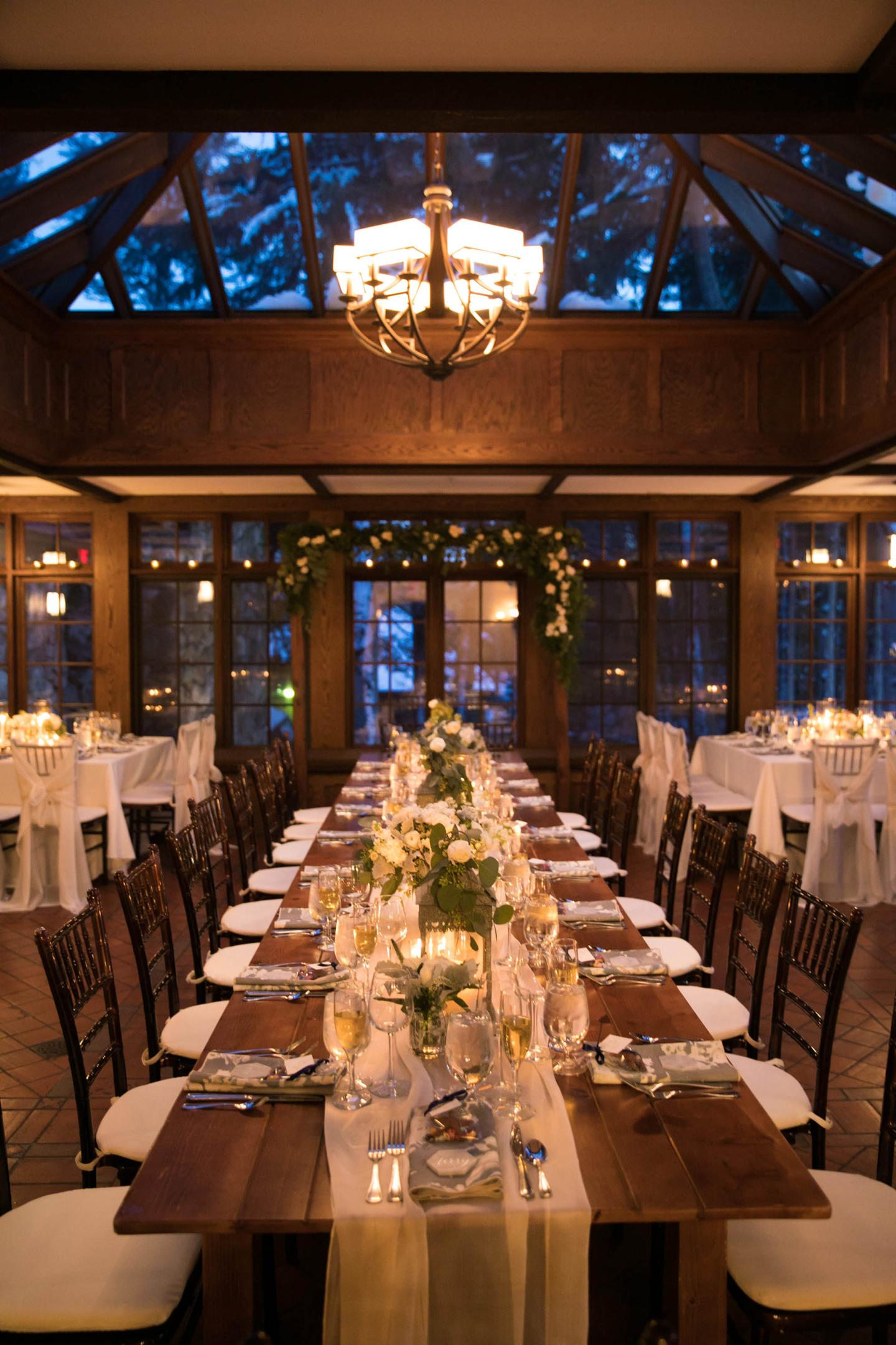 A conservatory set up for a wedding reception