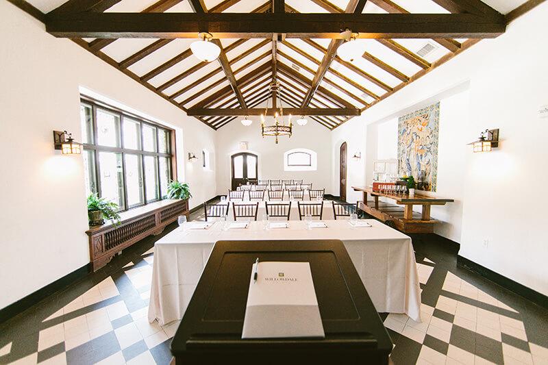 A traditional dining hall set up with tables and chairs