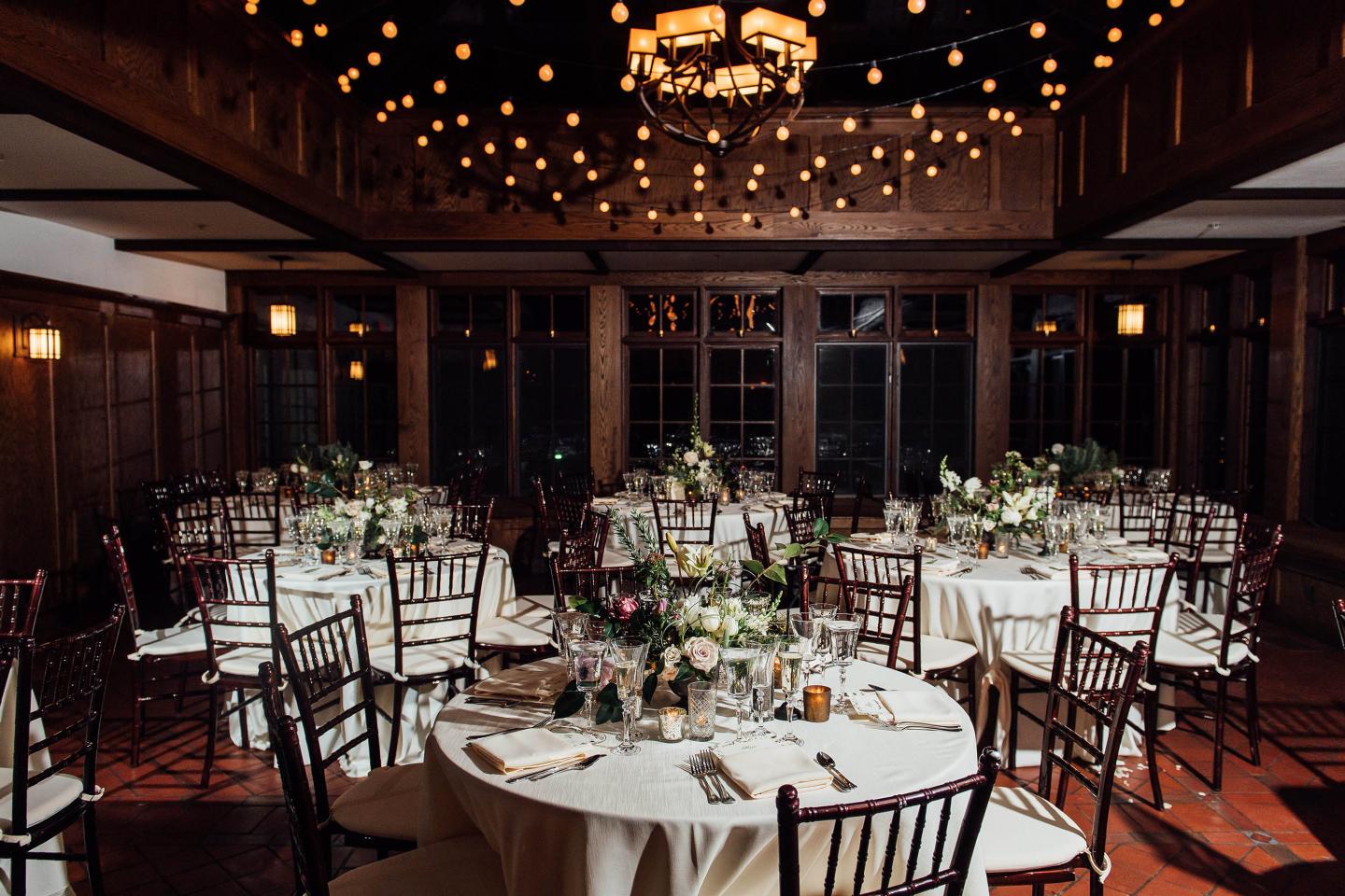 A conservatory set up for a wedding reception