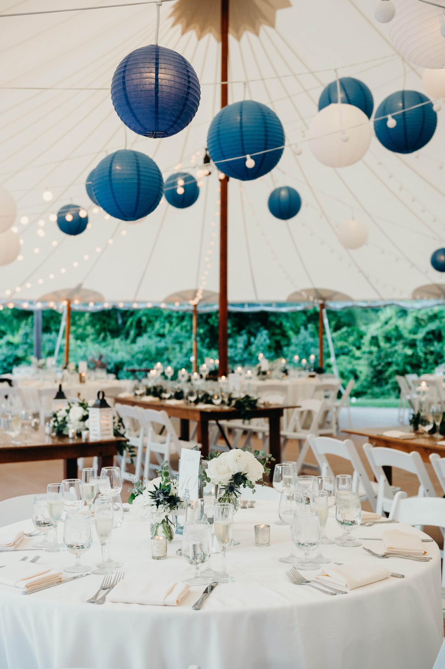 A tent set up for a wedding reception