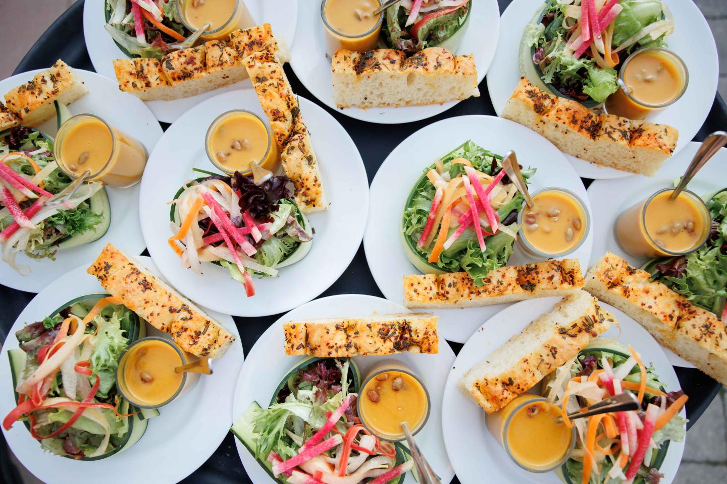 A spread of soup, salad and focaccia