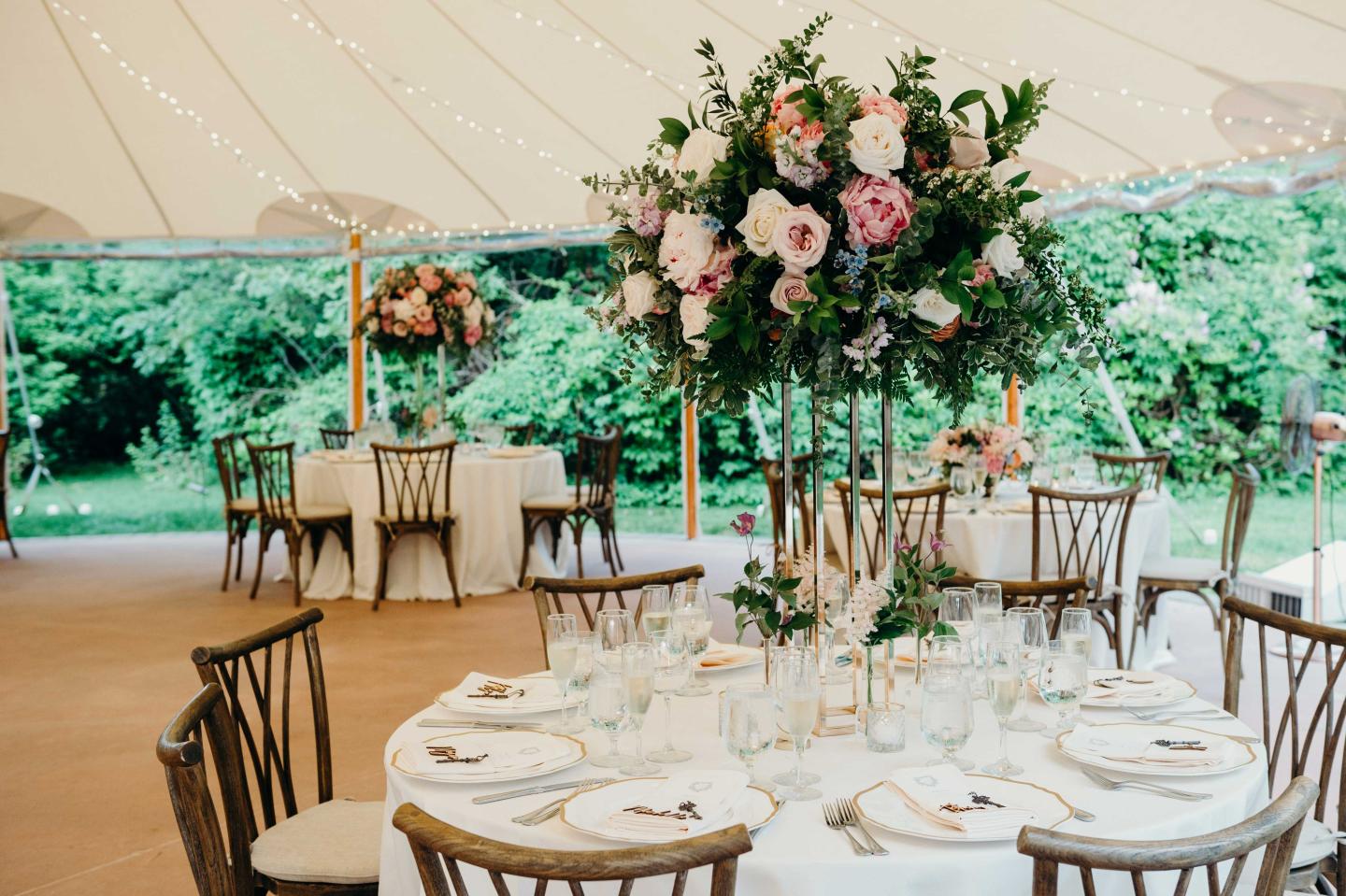 A tent set up for a wedding reception