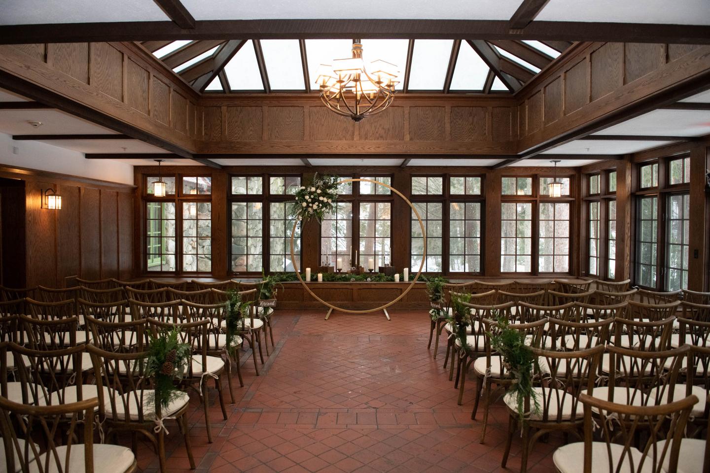 A conservatory set up for a wedding ceremony