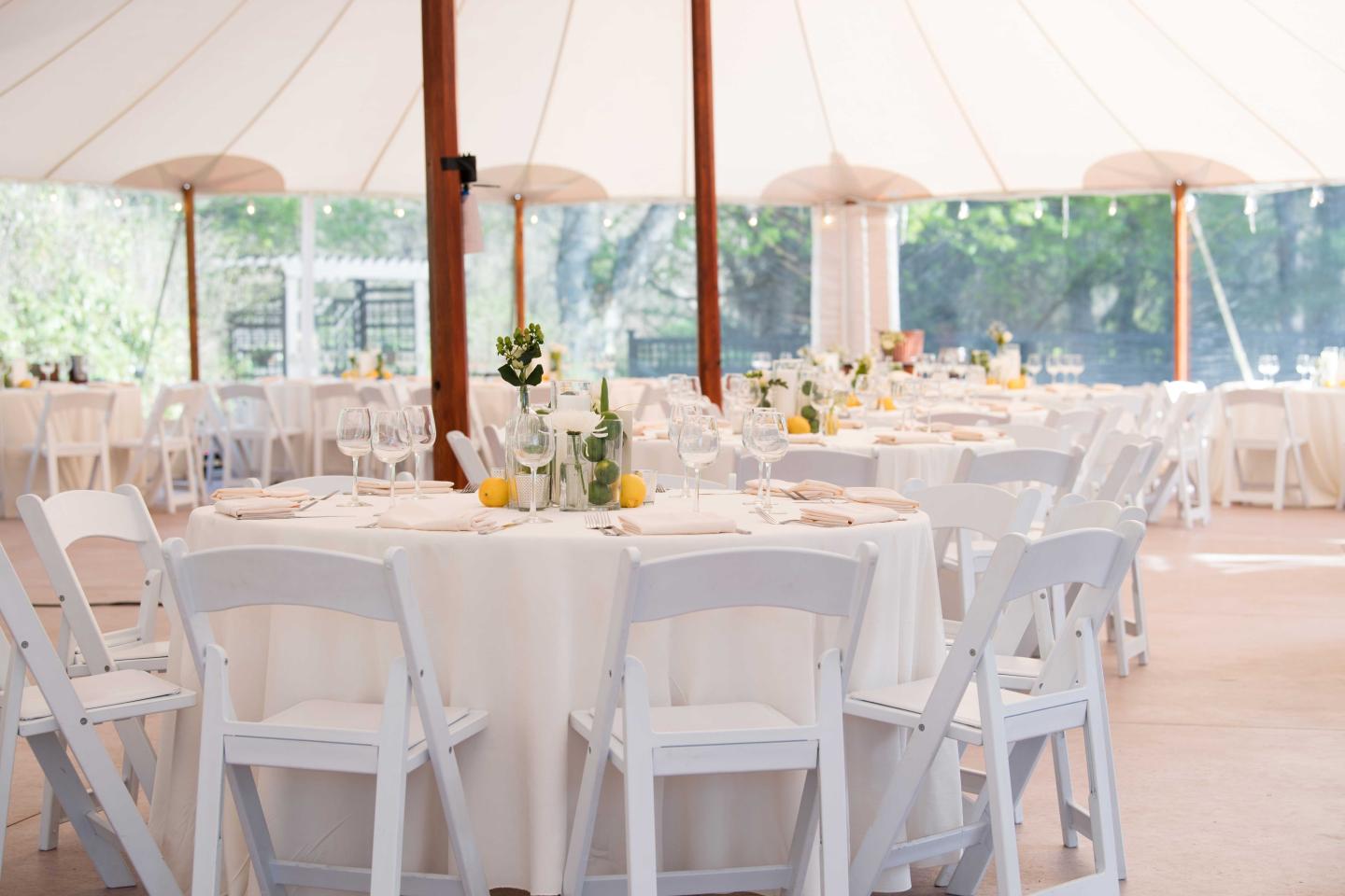 A tent set up for a wedding reception