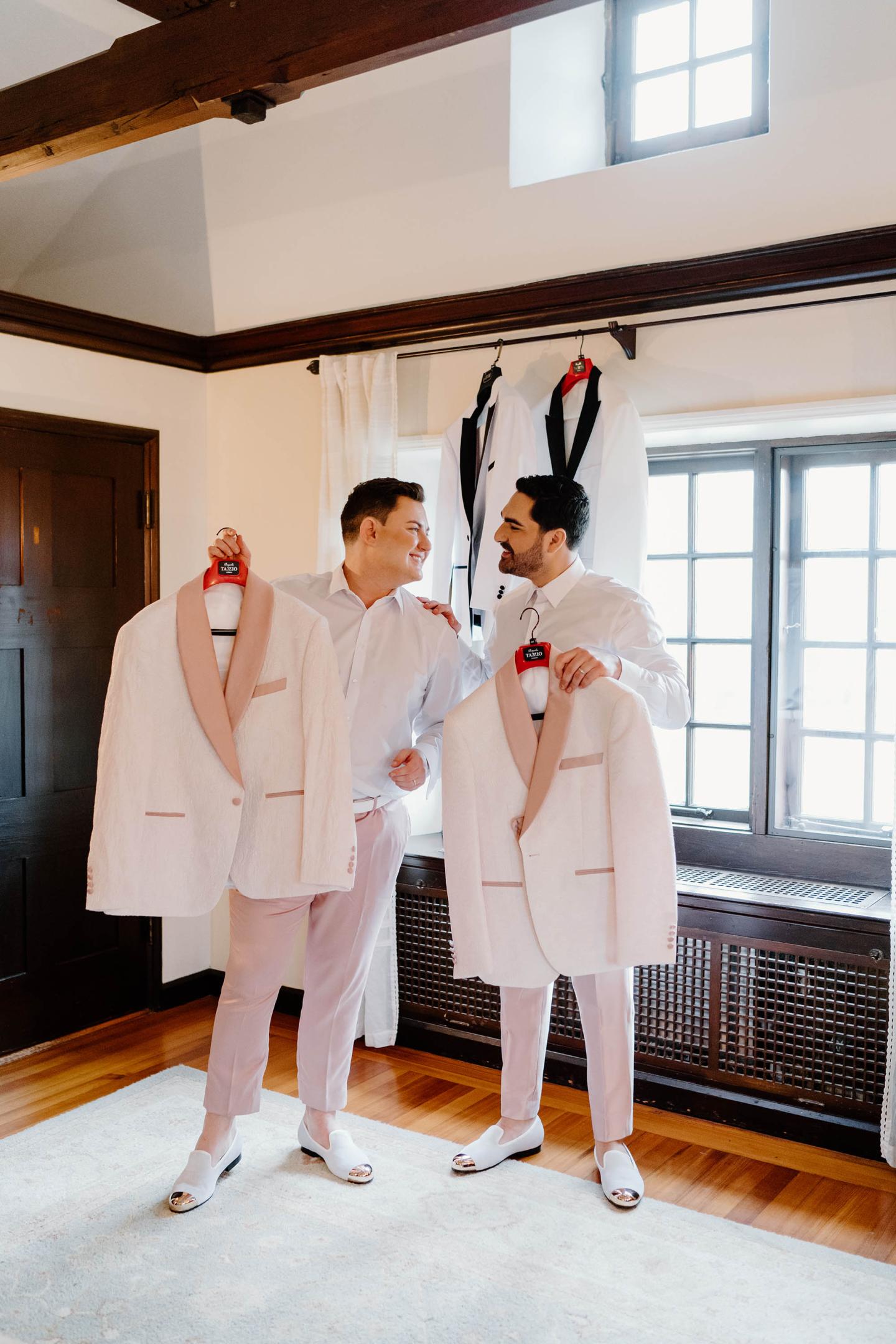 Two grooms getting ready