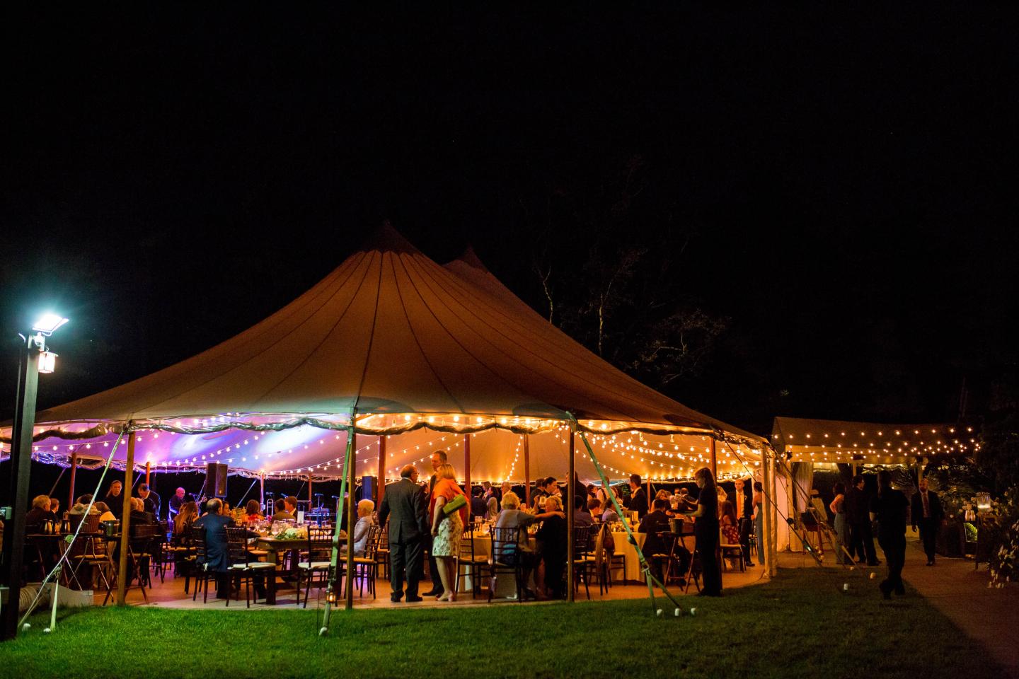 A tent wedding at night