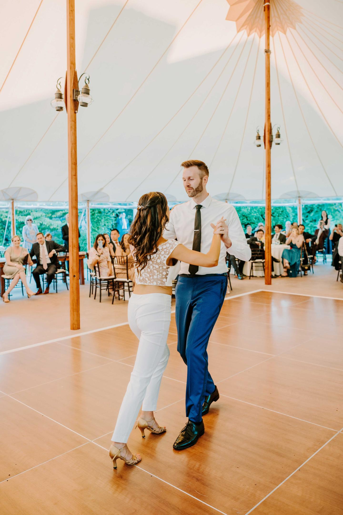 A bride and groom dancing