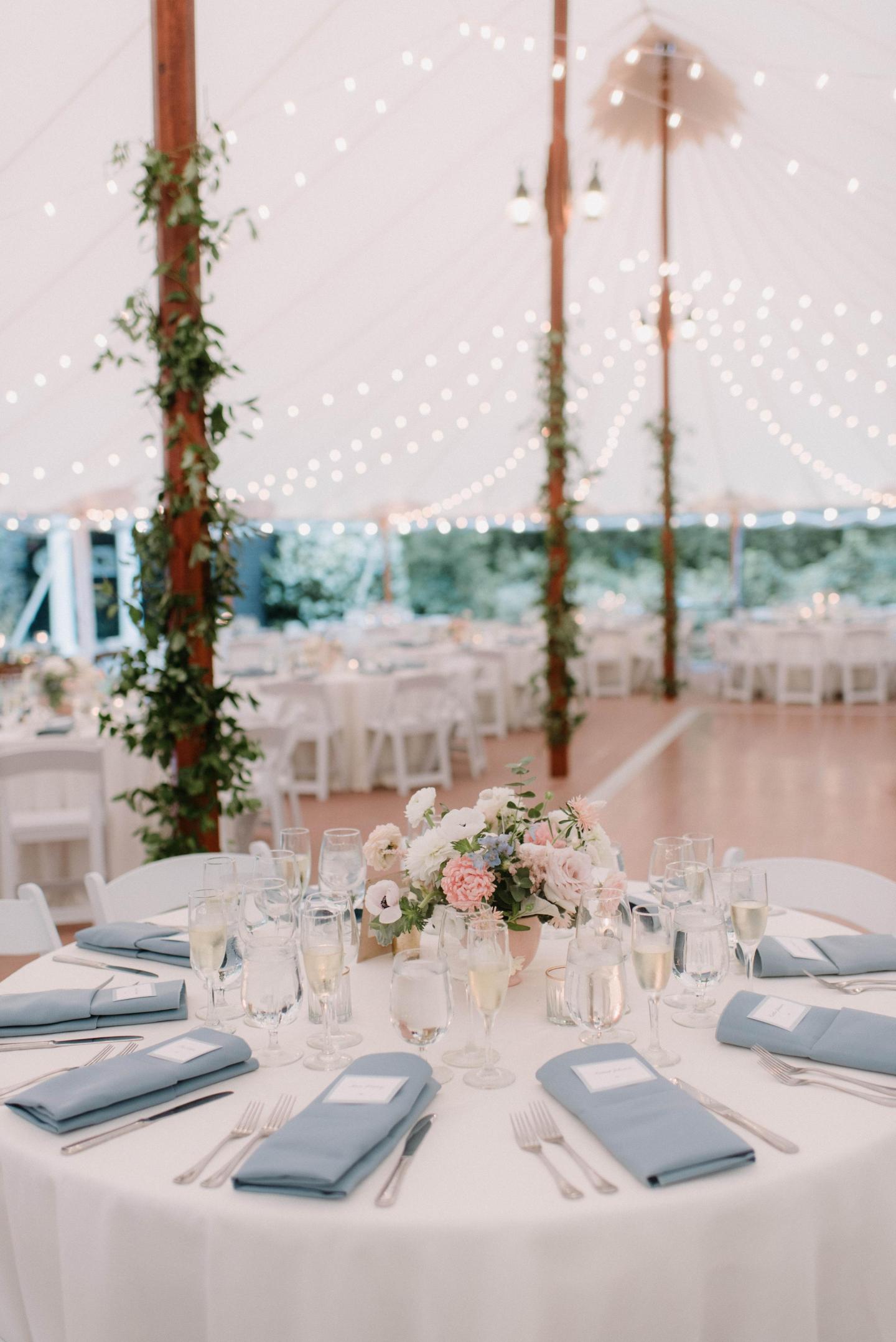 A tent set up for a wedding reception