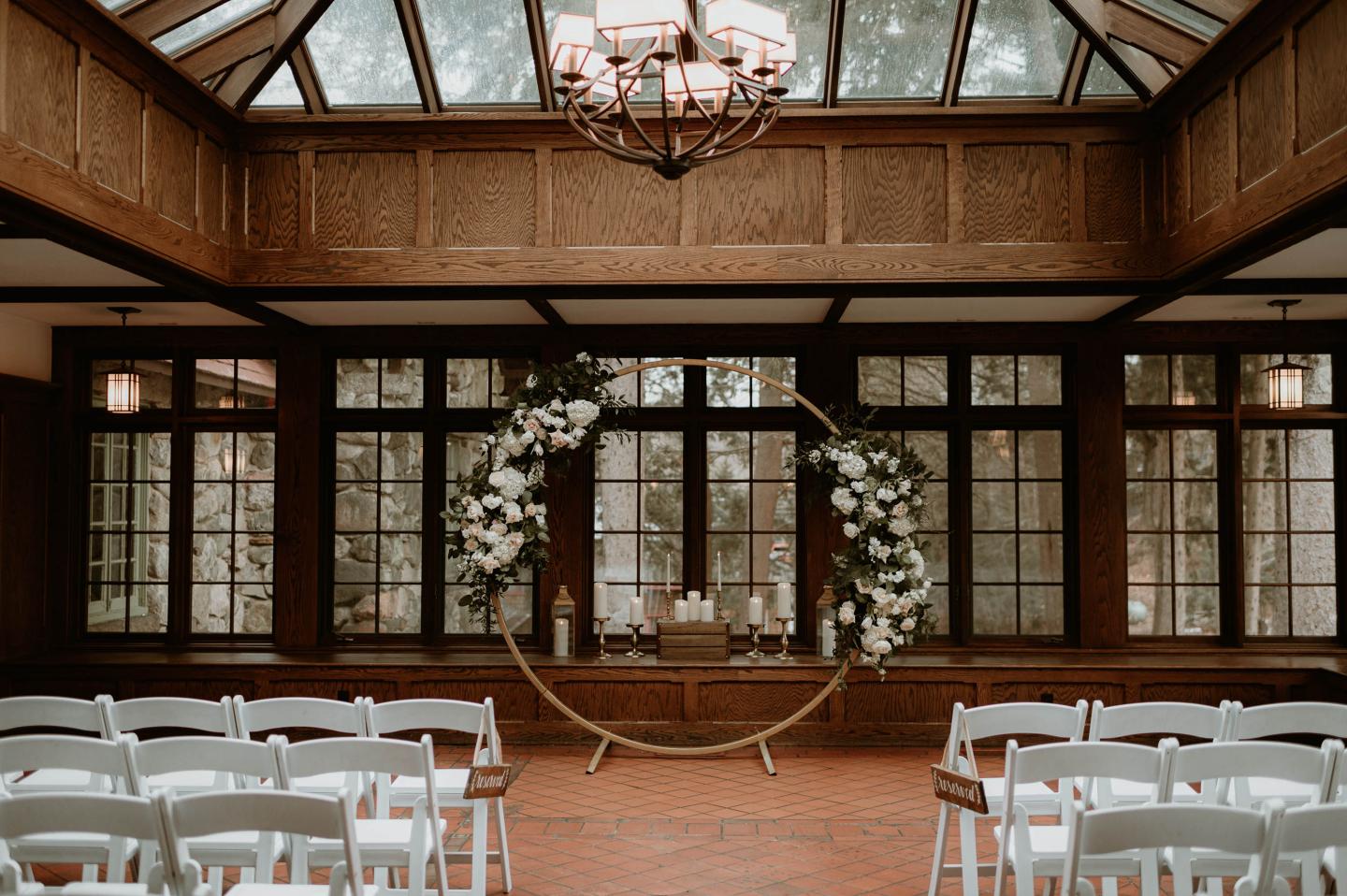 A conservatory set up for a wedding ceremony