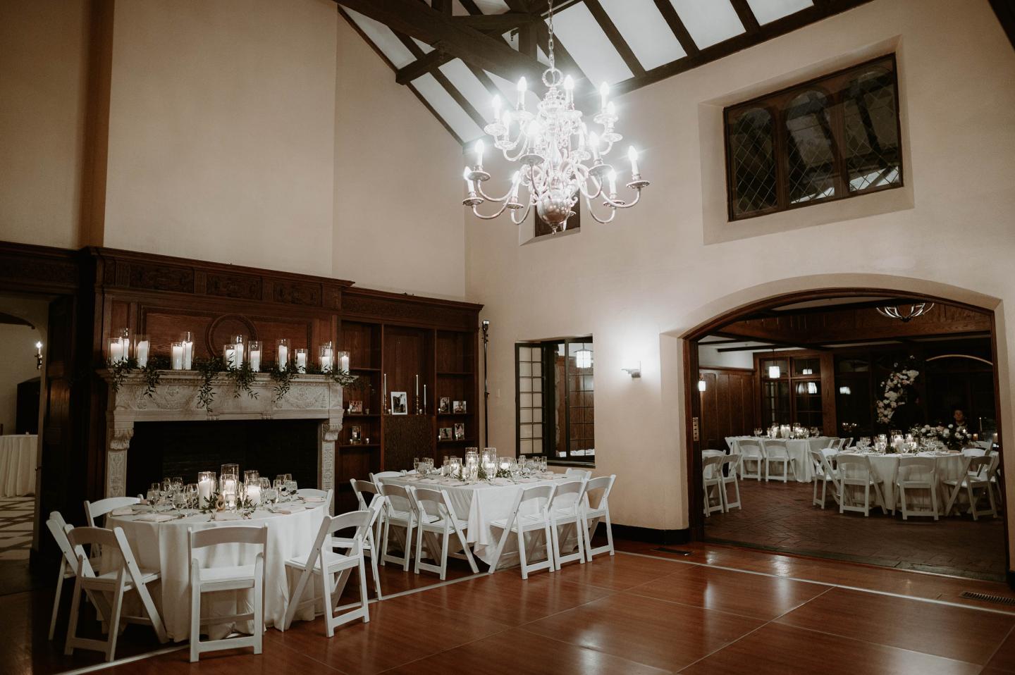 A conservatory and hall set up for a wedding reception