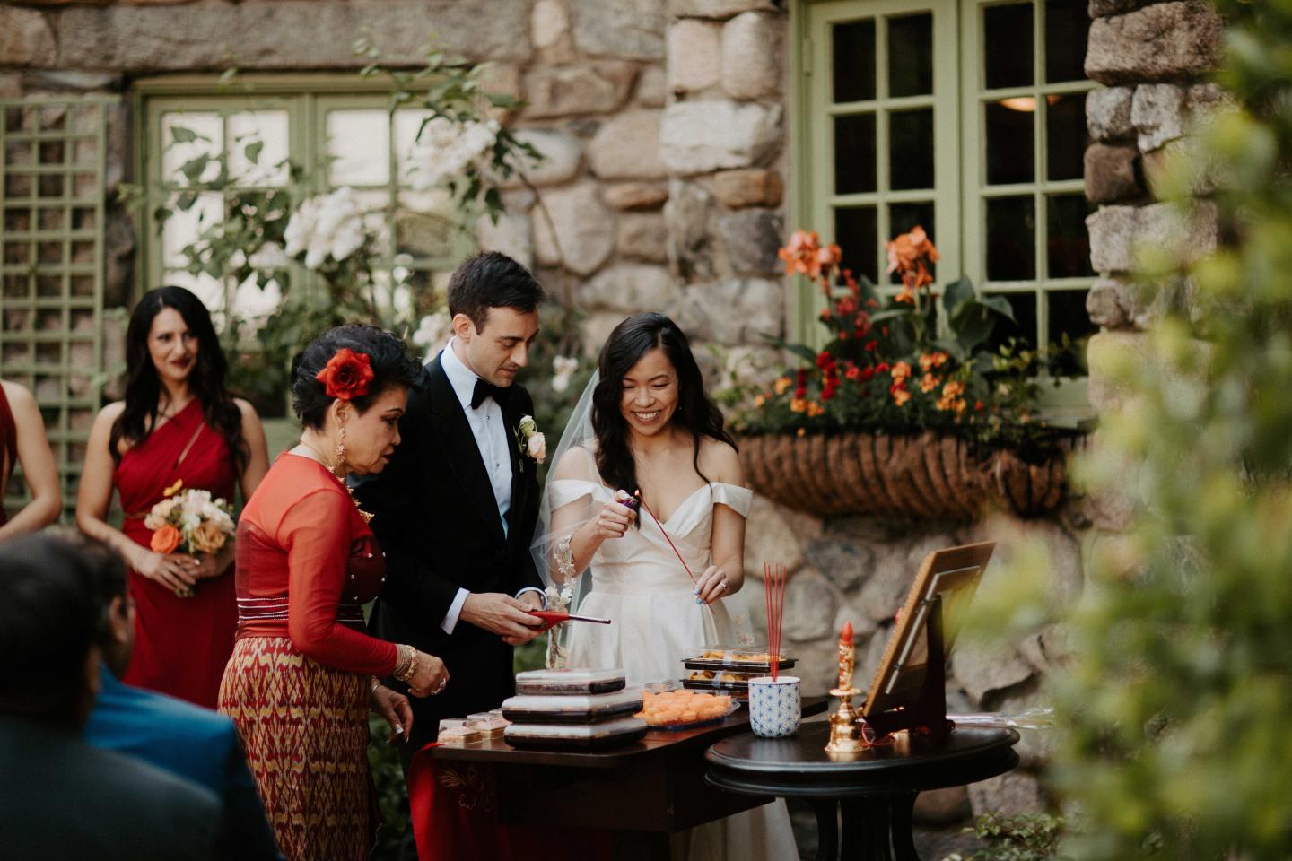 A bride and groom with wedding guests