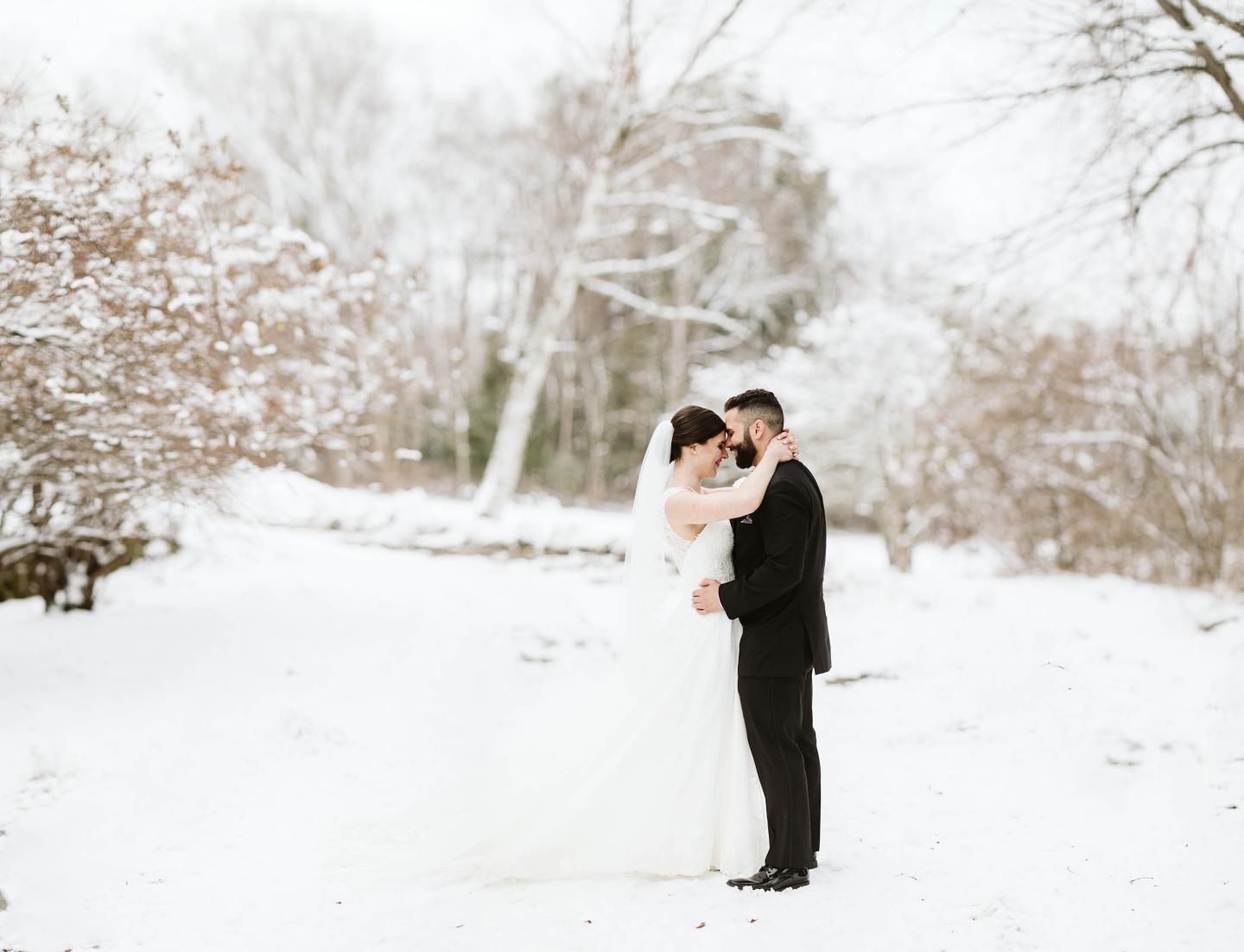 A bride and groom in winter