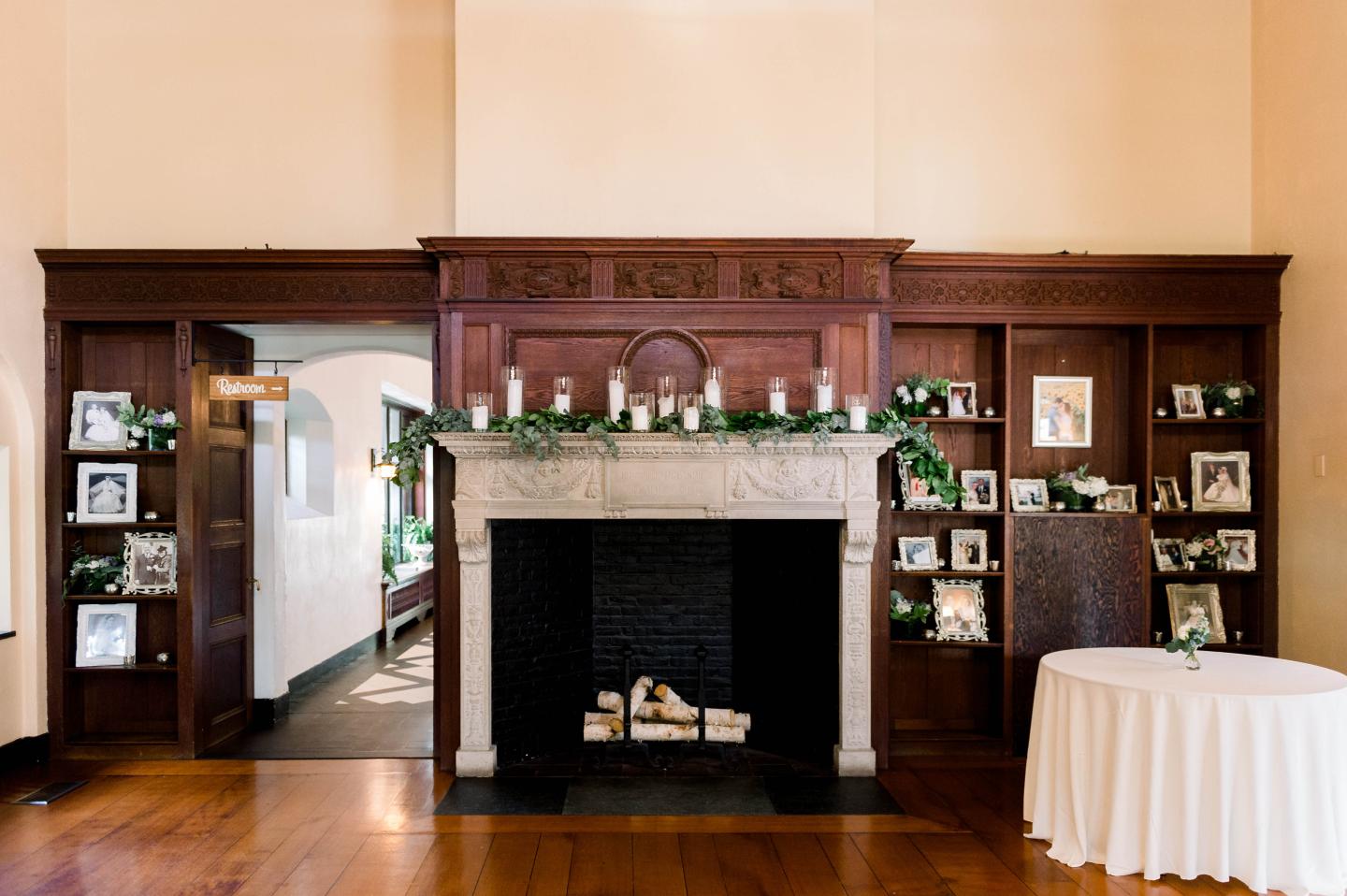 A fireplace decorated for a wedding