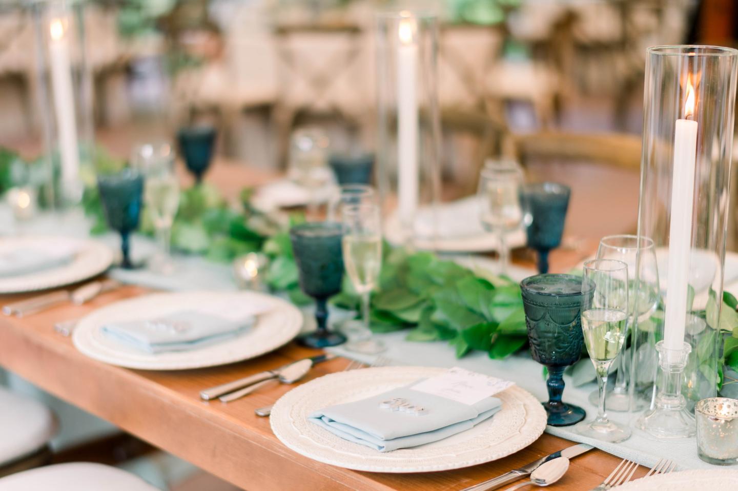 A close up of place settings at a wedding