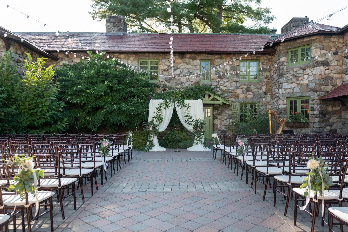 A courtyard set up for a wedding ceremony