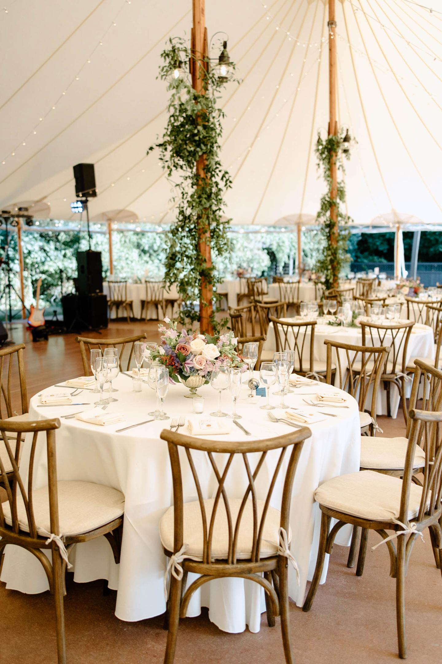 A tent set up for a wedding reception