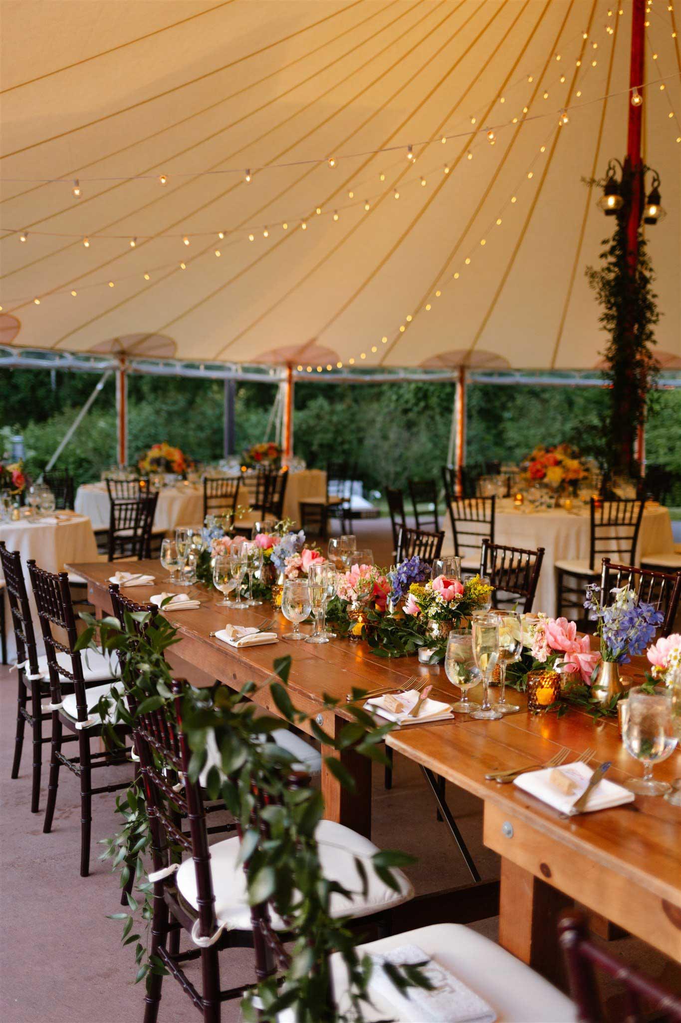 A tent set up for a wedding reception
