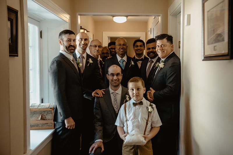 Groomsmen posing for a photo