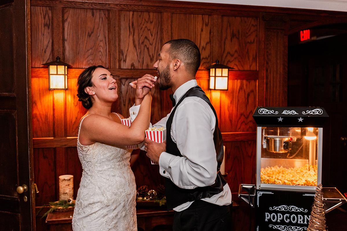 couple with popcorn cart