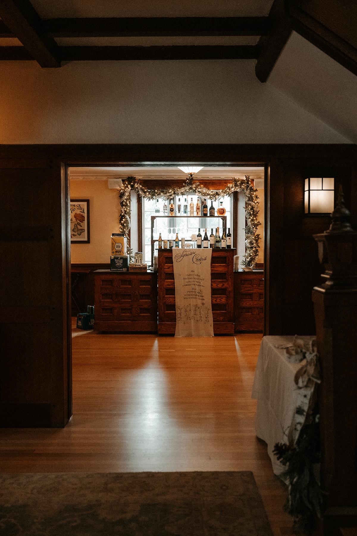 Warmly lit vintage room with wooden furniture and decor.
